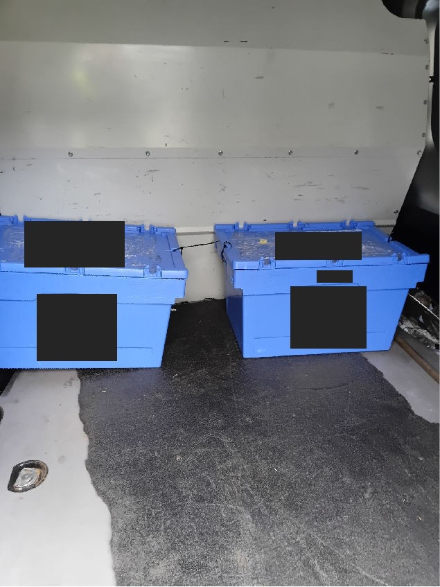 Two cases loaded for a hospital collection, identifying labels redacted
