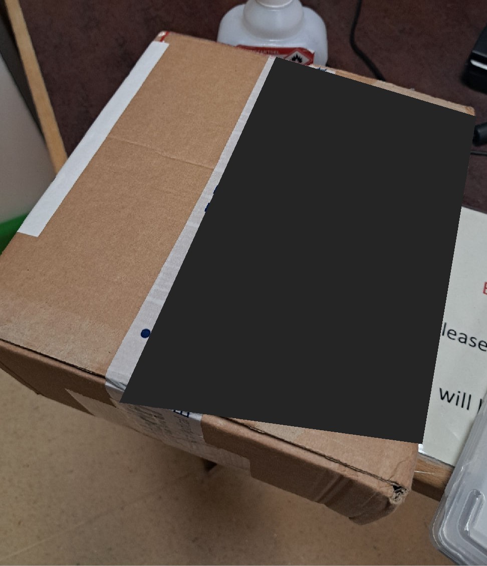 Boxed consignment at the hospital receiving point, with labels redacted