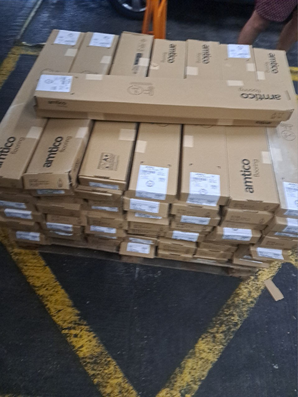 The flooring cartons on a pallet at the London delivery point.